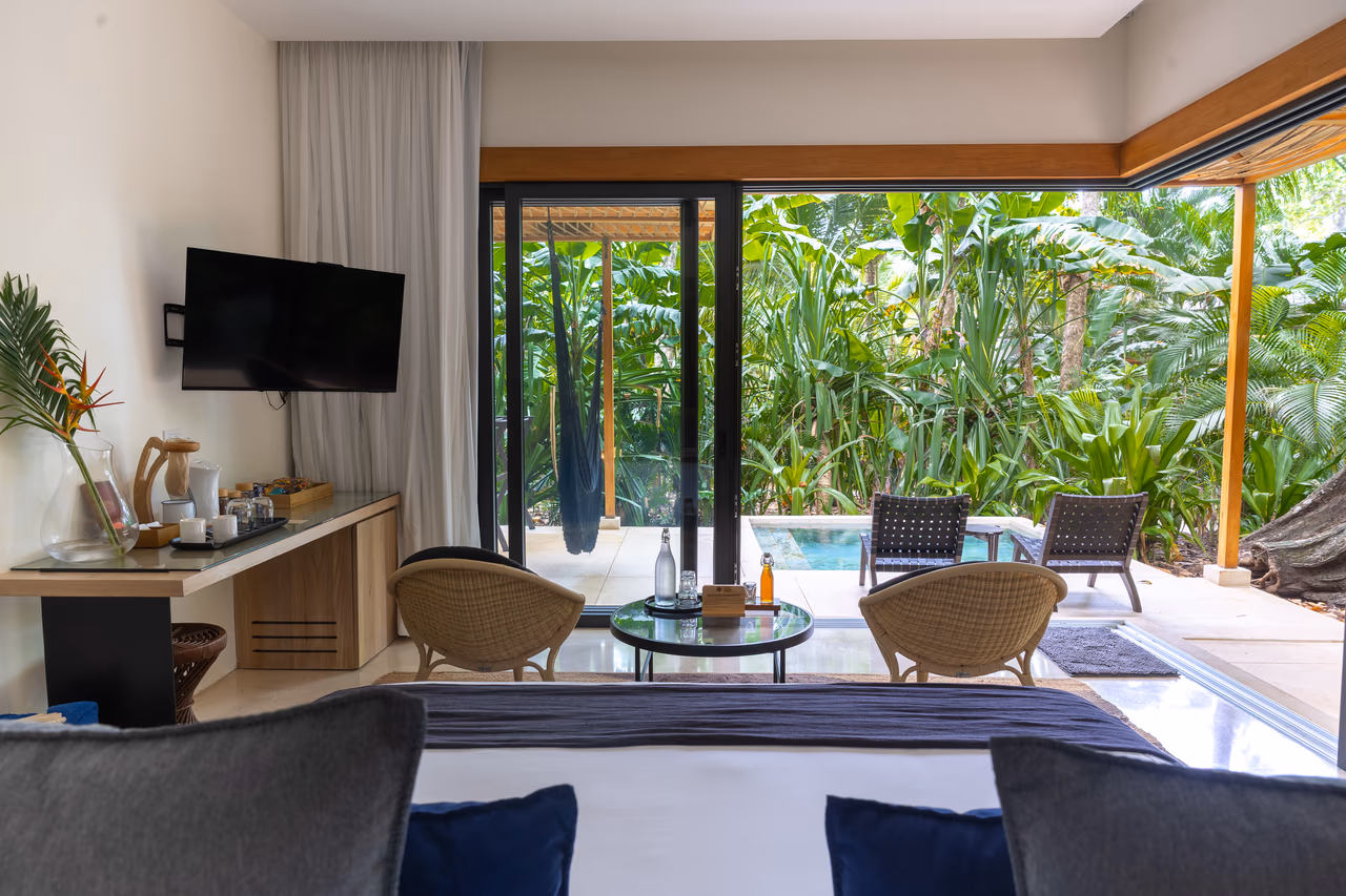 Manti Bungalow bedroom and sitting area overlooking the private terrace