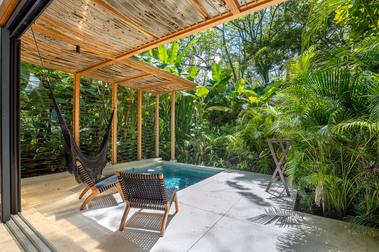 Manti Bungalow private plunge pool and hammock beneath a shaded terrace